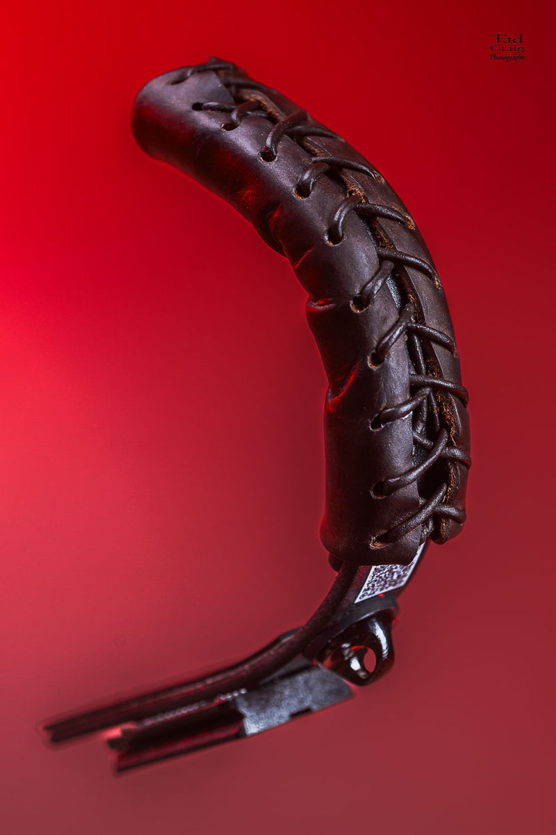 Detail of Brown Leather Camera Handle with lacing